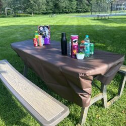 brown tarp covering picnic table