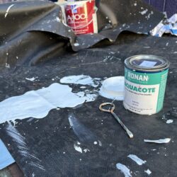 paint spilled on drop cloth